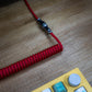 GLOW RED SYMMETRICAL AV CABLE