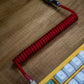 GLOW RED SYMMETRICAL AV CABLE